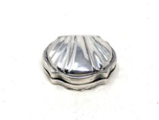 A continental embossed silver pill box, width 6cm. CONDITION REPORT: 34.