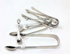 Six pairs of George III and later silver sugar tongs including Newcastle CONDITION