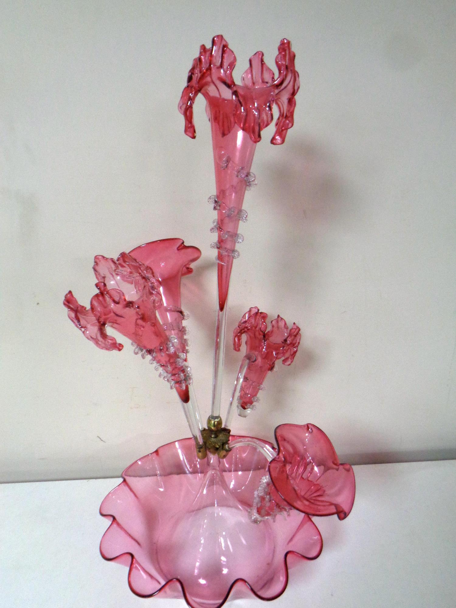 A cranberry glass five branch epergne,