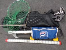 A set of Howson gold irons in bag together with a tube containing golf balls, a golf ball collector,
