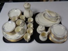Two trays containing fifty three pieces of Royal Doulton The Romance Collection Juliet china tea