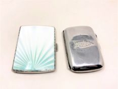 A silver and enamel cigarette case, together with another silver cigarette case.