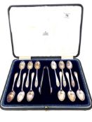 A cased set of twelve silver teaspoons and matching tongs, John Round & Son, Sheffield 1905.