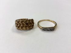 A 18ct gold three stone diamond ring (1.8g), together with a further yellow gold ring (3.3g).