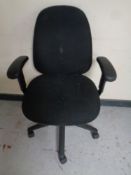 A swivel typists armchair