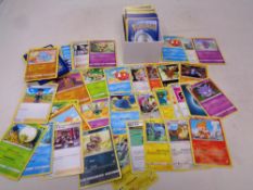 150 Pokemon cards including energy and trainer cards