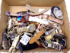 A box containing a quantity of lady's and gents wristwatches,