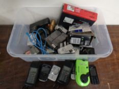 A crate containing vintage mobile phones by Nokia, digital cameras,