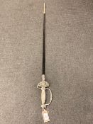 A good quality ceremonial dress sword, gilded mother of pearl hilt, black leather scabbard,