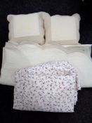 Two boxes of floral bed throw,