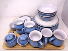 A small quantity of Denby blue tea and coffee china