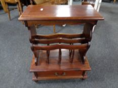 An Eastern mahogany magazine table fitted a drawer