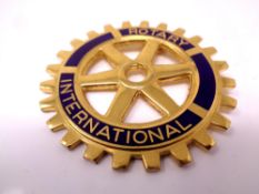 A Rotary International medallion.