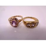 Two 9ct gold dress rings set with gemstones.
