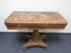 A Victorian rosewood pedestal card table