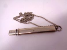 A vintage silver pencil on chain.