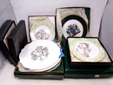 Two crates of boxed collector's plates,