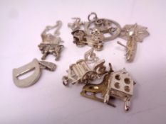 A small quantity of silver charms.