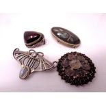 4 vintage silver brooches.