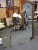 A 20th century frameless mirror together with a further dressing table mirror and an Edwardian