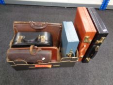 A box of six assorted vintage and later leather briefcases,