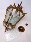 An antique style gilt brass hall light