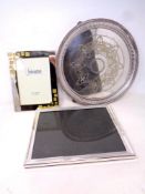 A silver plated pierced rim salver together with 2 photograph frames.