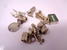 A small quantity of silver charms.