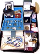 A large tray of costume jewellery, vintage brooches,