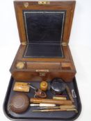 A 19th century mahogany writing box together with a brass mounted pipe, lacquered box,