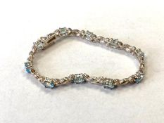 A Silver Blue Topaz bracelet.