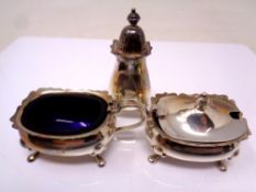 A three piece silver cruet set (Af)