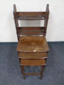 A set of Edwardian open shelves together with a nest of tables