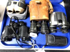 A tray of binoculars and field spectacles