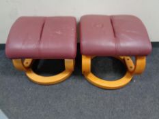 A pair of contemporary Burgundy leather upholstered footstools
