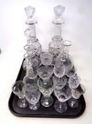 A pair of cut crystal mallet shaped decanters together with a quantity of crystal and glass