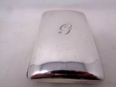 A silver cigar case engraved the letter G, 156.5g.