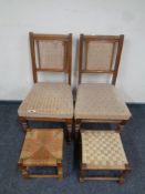 A pair of Edwardian oak dining chairs together with two rush seated stools