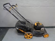 A Mcculloch self drive petrol lawn mower