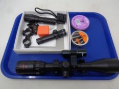 A tray of air rifle pellets, spotting scope,