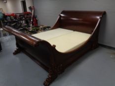 A good quality And So To Bed Ltd mahogany 6' sleigh bed frame with ornately carved base