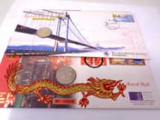 A Royal Mint Hong Kong uncirculated coin stamp cover together with a further Hong Kong 10 dollar