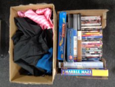 A box of women's clothes, board games, jigsaws,