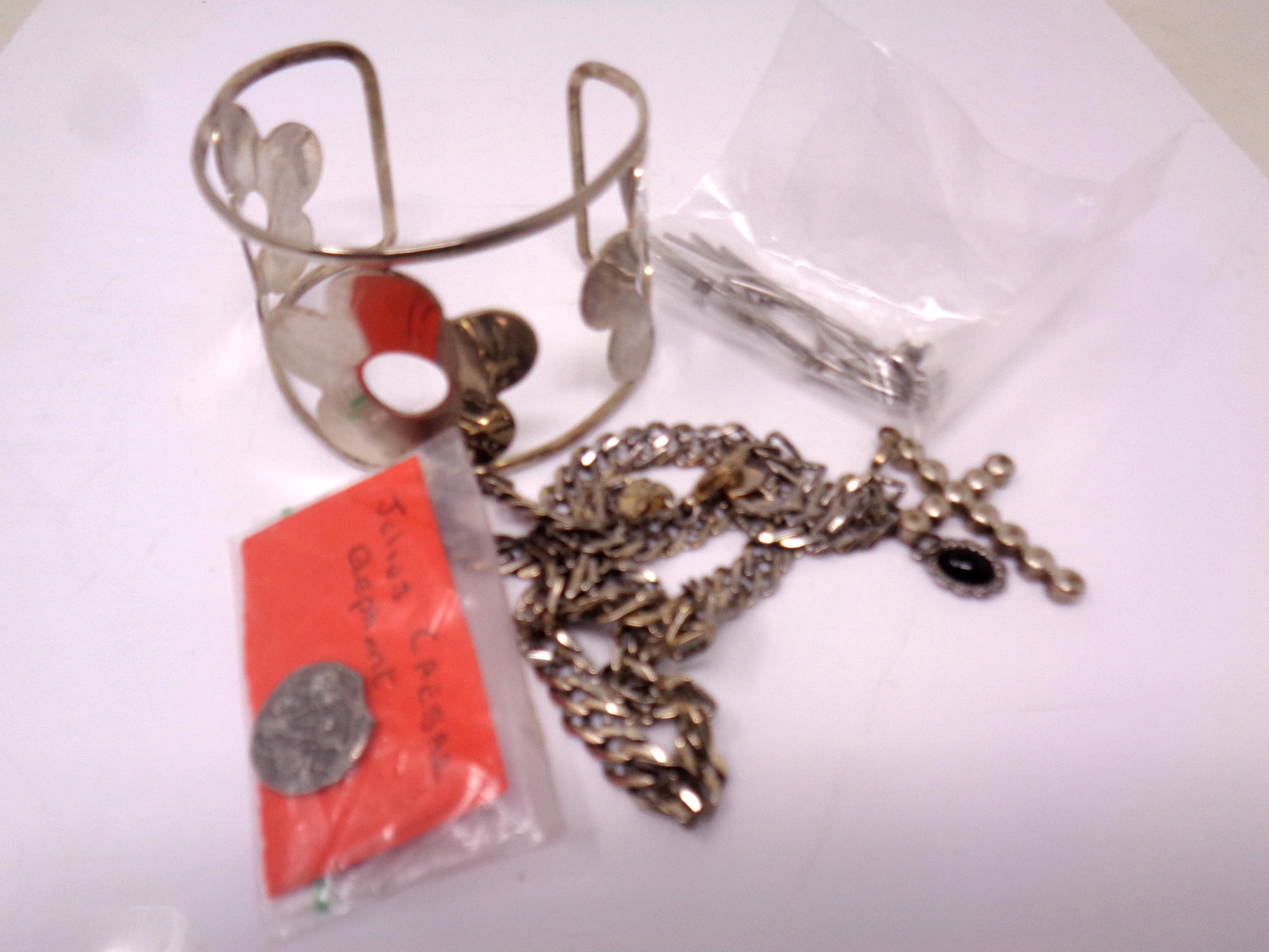 A small quantity of costume jewelry. Cuff bracelet etc.