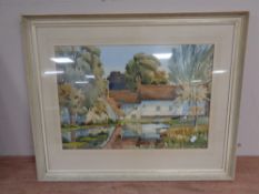 Frank Norman : Buildings by a lake, watercolour, signed, framed.