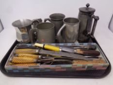 A tray of antique cutlery, part carving set,