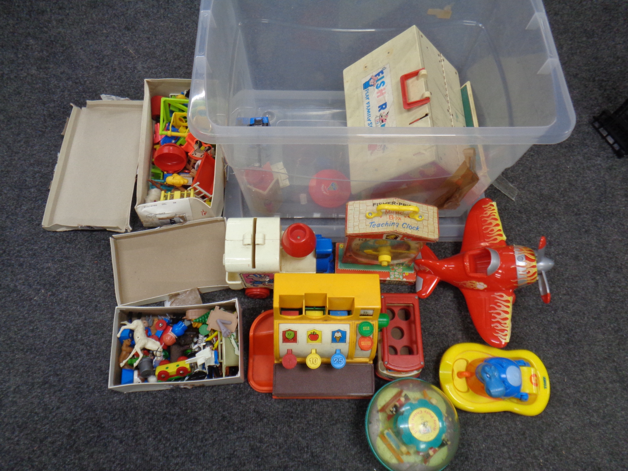 A box of children's toys vintage and later