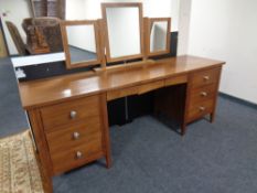A good quality Barker and Stonehouse oversized twin pedestal dressing table fitted with nine
