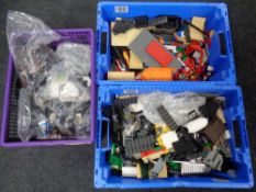 Three crates of Lego and other plastic building blocks