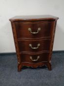 A good quality Barker and Stonehouse Victorian style serpentine fronted three drawer chest